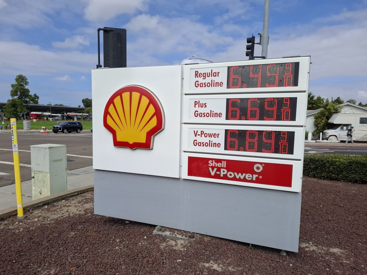 A gas station price sign in Chula Vista, California, in September 2026 showing regular, plus and premium prices